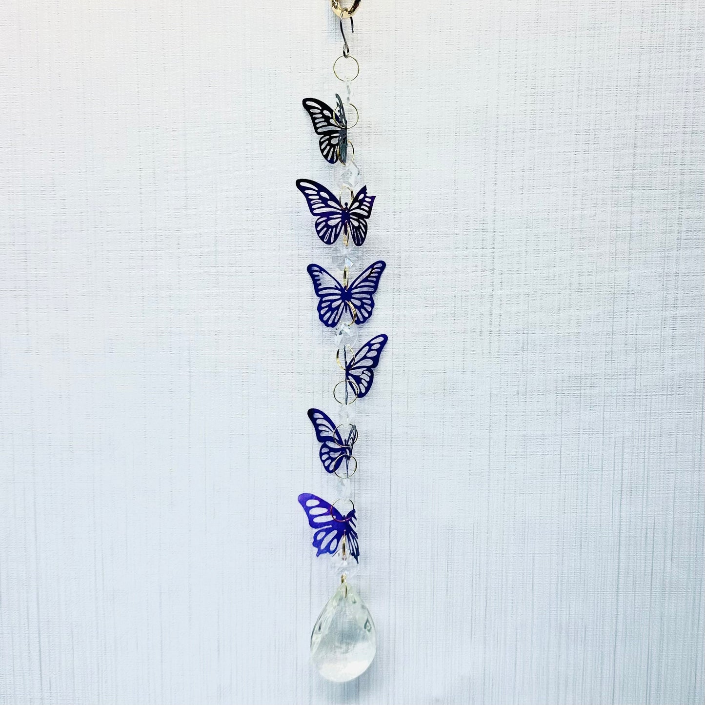 Broken butterfly strand suncatcher