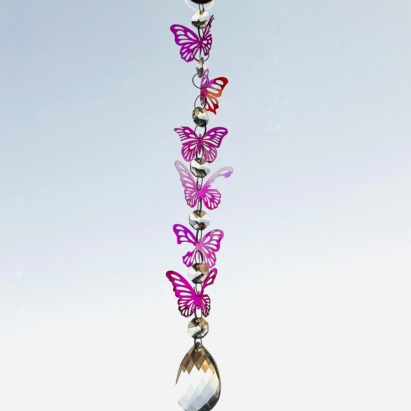 Broken butterfly strand suncatcher