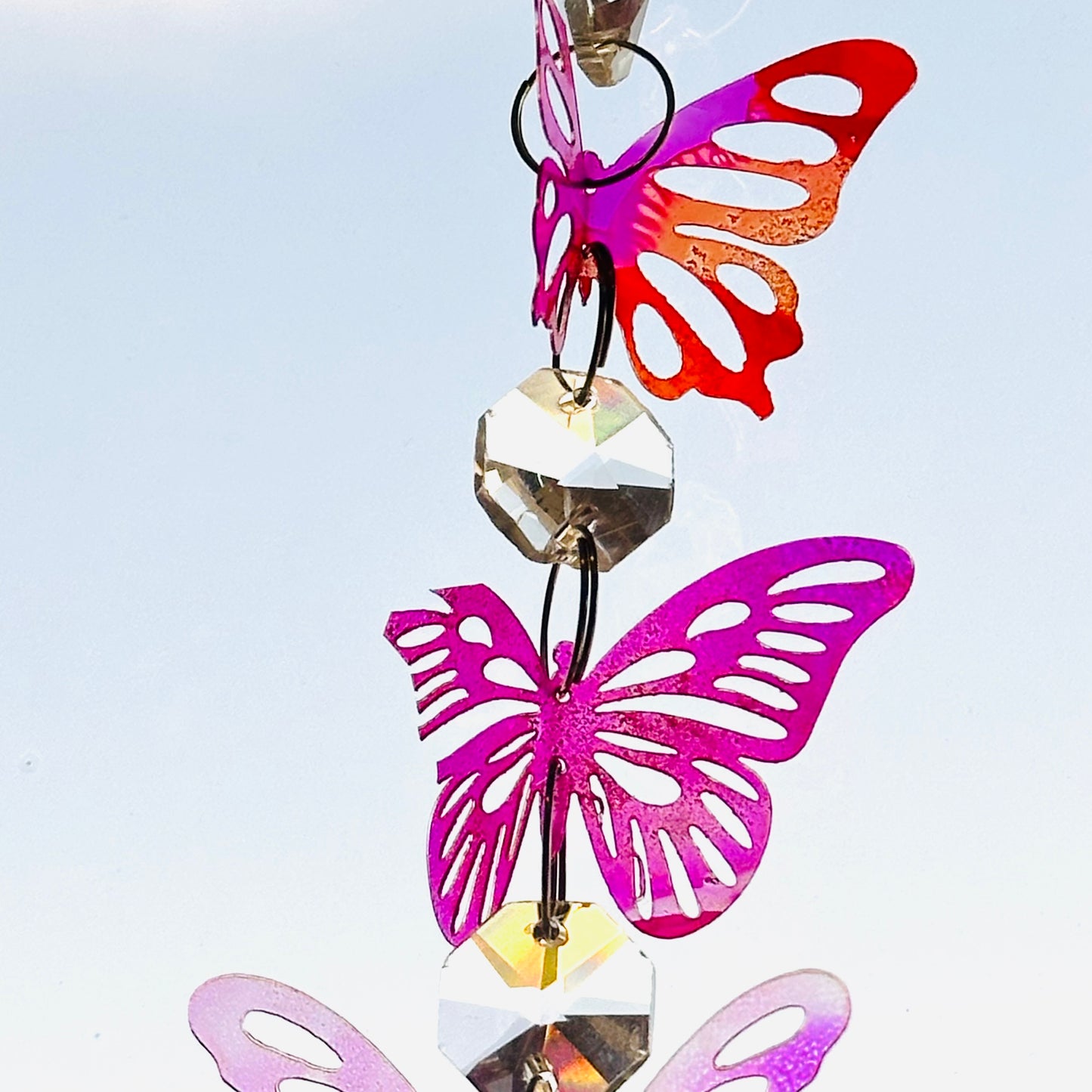Broken butterfly strand suncatcher