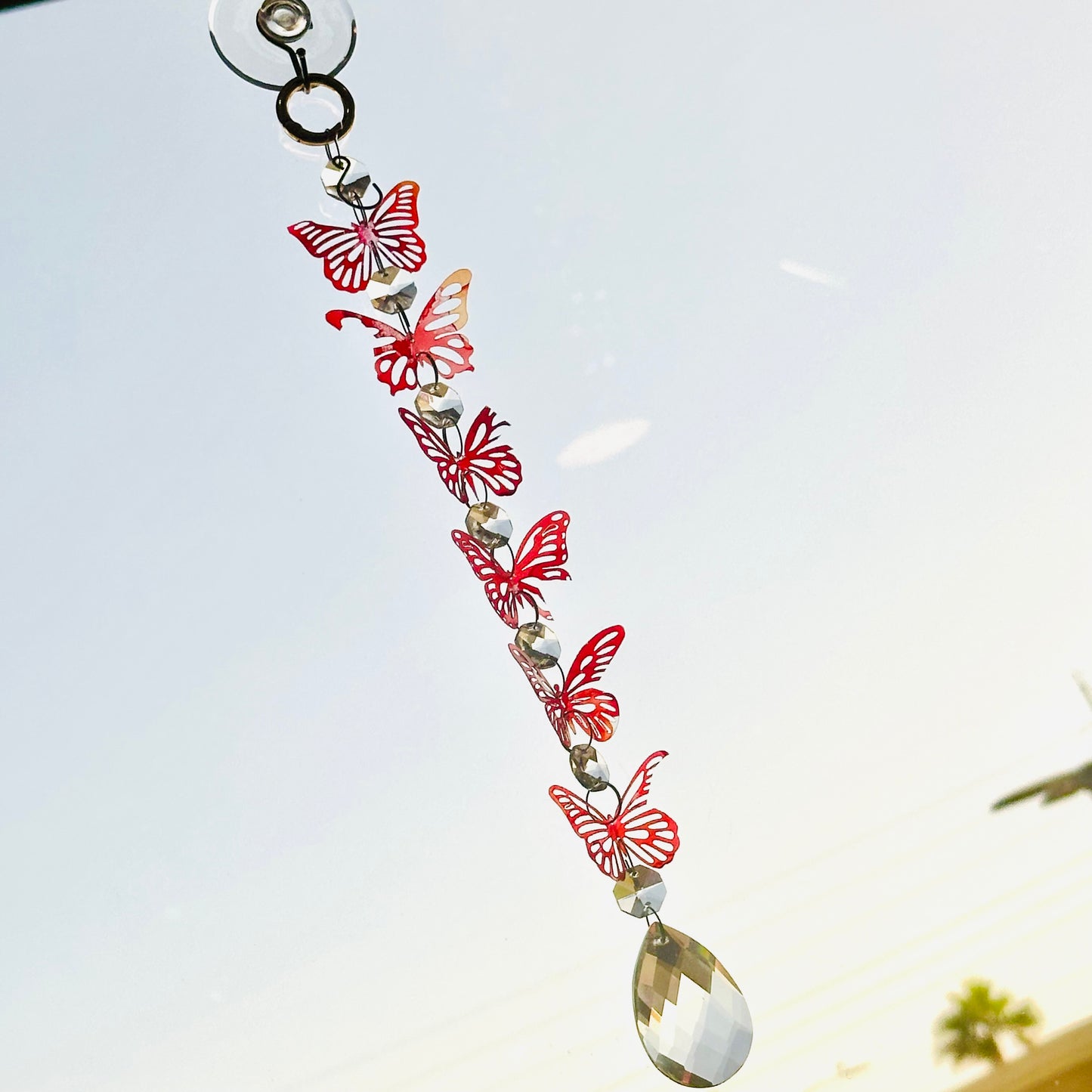 Broken butterfly strand suncatcher