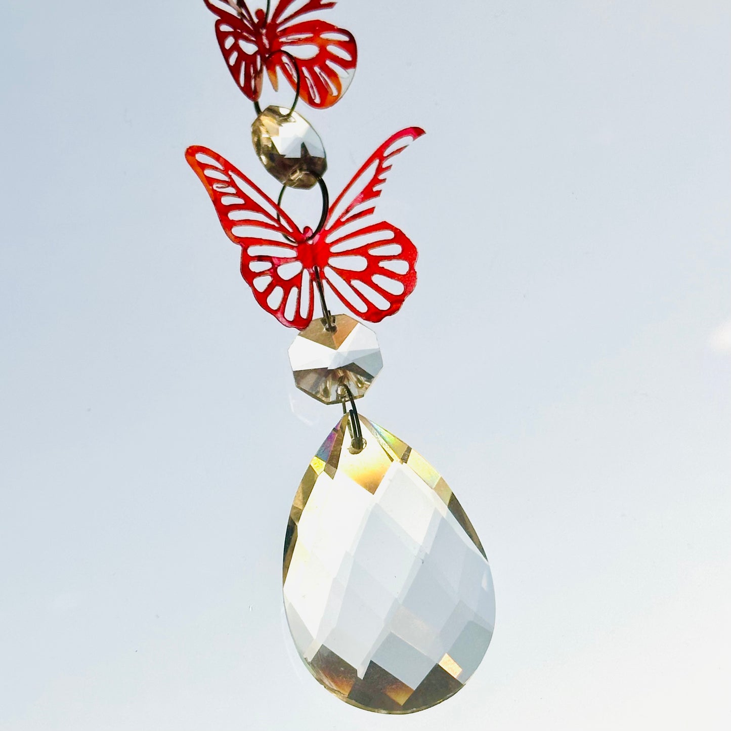 Broken butterfly strand suncatcher